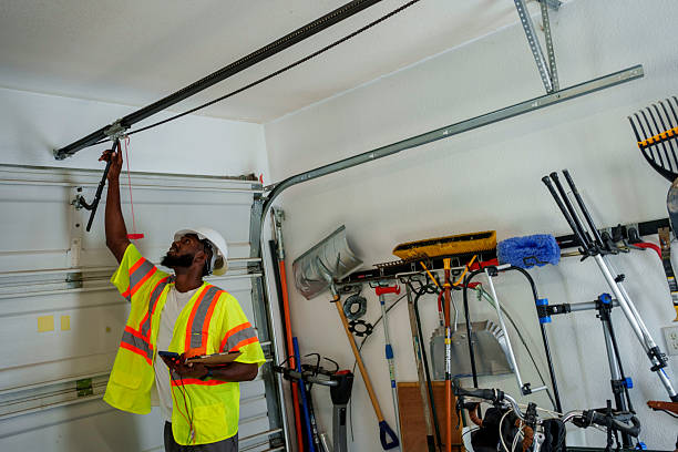 Professional Garage Door Roller Replacement technician working in Culver, IN